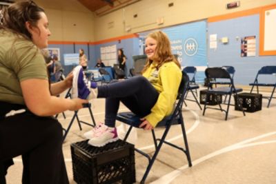 Reliable Subaru delivers 504 new shoes to students at Westport Elementary in partnership with UWO