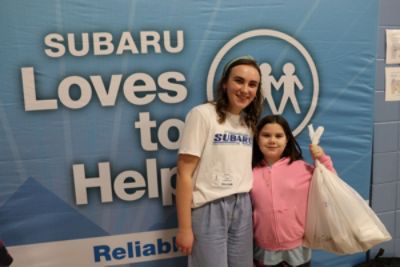 Reliable Subaru delivers 504 new shoes to students at Westport Elementary in partnership with UWO