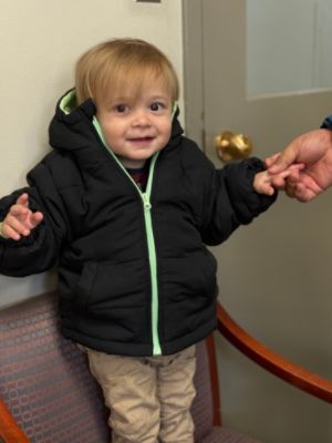 Joshua loves his new coat!