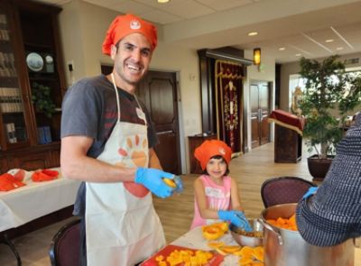 Feeding the Needy with Chabad Cares Kitchen of Kindness