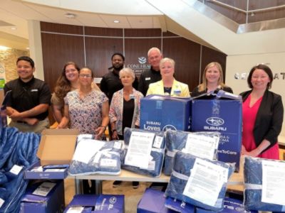 The Leukemia & Lymphoma Society and Flow Subaru Burlington delivery to Cone Health Cancer Center