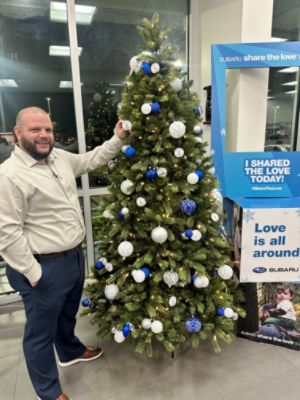 Subaru North Miami Shares Love: Uniting for Children's Health and Nationwide Charities.