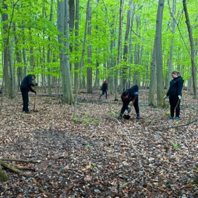Volunteering in Tinker Nature Park to help grow a greener and healthier community.