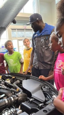 CHILDREN FROM BOYS & GIRLS CLUBS OF PALM BEACH COUNTY EXPLORE ADVENTURE IN THE SUBARU SHOWROOM