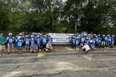 New Jerseys for the Mandarin Hawks Football Team, Courtesy of Hanania Subaru