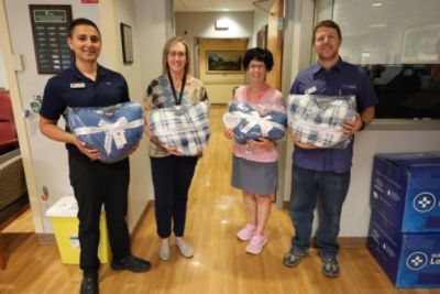 Delivering pillows and blankets to Confluence Health Oncology departments