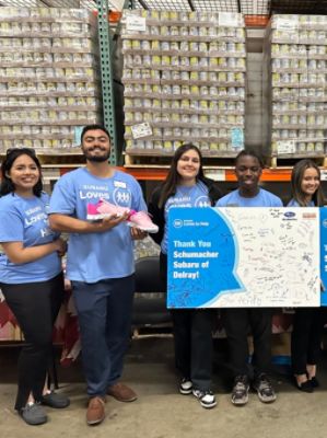 Schumacher Subaru of Delray Donates Brand-New Shoes and Socks to Children in Our Community