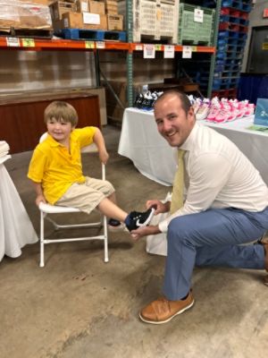 Schumacher Subaru Shoe Donation Event