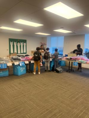 Giving Warmth, Building Hope 💙🧥👟