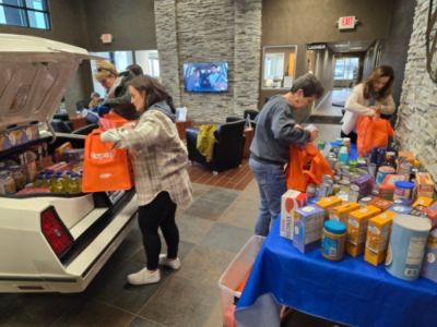 Stocking the Shelves at The Hope Center