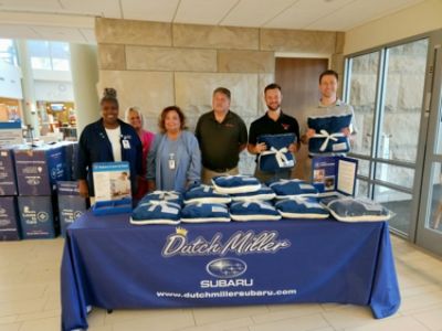 Dutch Miller Subaru Passes Out Blankets to Cancer Patients