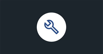 A white circle with a blue icon of a wrench representing the MySubaru Service Appointment Scheduler.
