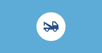 A tow truck icon representing 24-hour roadside assistance.