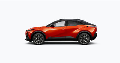 Side view of a 2027 Subaru Uncharted in orange.