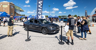 Subaru WRX behind ropes at enthusiast event