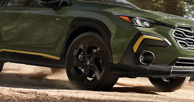 A close up of a front tire of the 2025 Subaru Crosstrek, representing its 8.7 inch ground clearance