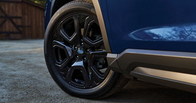 A close up of an alloy wheel and wheel well of a Subaru Ascent