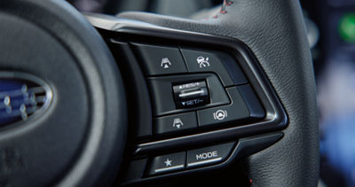 Los botones de selección de modo de manejo en el volante de un Subaru WRX 2025.