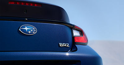 Rear cargo hatch and rear lights of a 2026 Subaru BRZ.