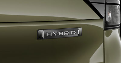 The Subaru Hybrid logo on the rear cargo hatch of a 2026 Subaru Forester.