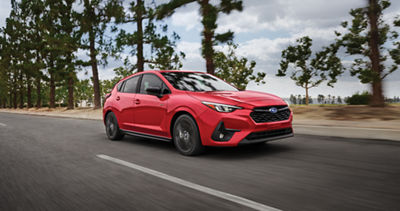 New Subaru Impreza hatchback on the road