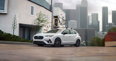 2026 subaru impreza rs in crystal white pearl driver side exterior view 