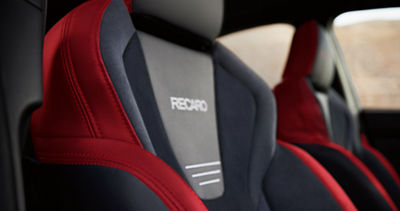 A performance-designed Recaro front seat in a WRX four-door sports sedan. 