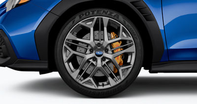 A close-up of a 19-inch alloy wheel on a Subaru WRX tS.