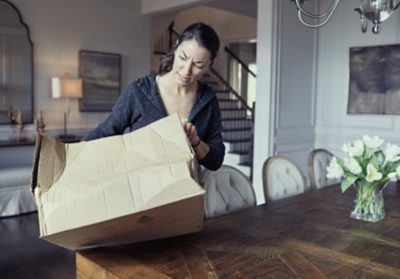 smashed package showing upset customer