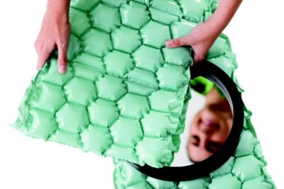 woman holding recycled inflatable cushioning