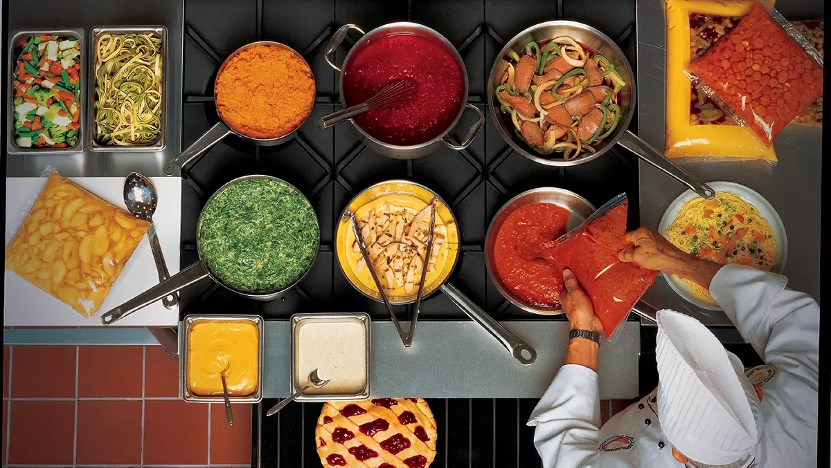overhead view of chefs making sauces