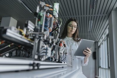 lab researcher looking at tablet