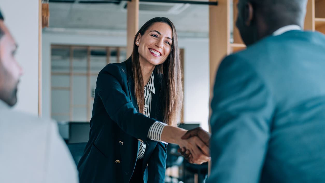 lady shaking hands with a guy