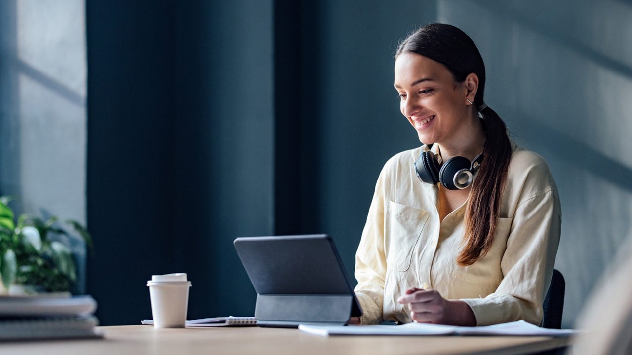 Woman looking at a computer