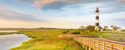 Part of the beautiful Cape Hatteras National Seashore, the Bodie Island Lighthouse is an Iconic Lighthouse of Nags Head Outer Banks North Carolina. This incredible stretch of coastal barrier islands along the east coast of NC is known for its amazing beaches and abundant wildlife.