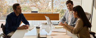 Team members reviewing documents.