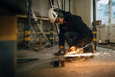 Construction worker using tool