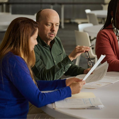 Man and woman looking at paperwork