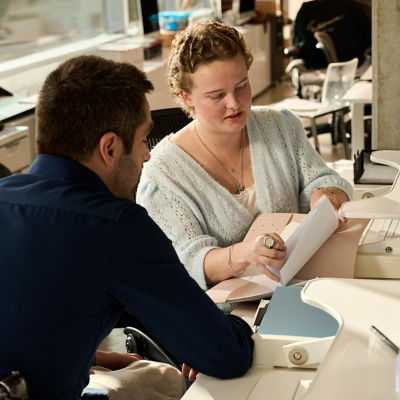 Woman sharing information with a man