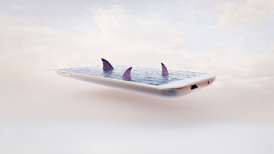 Silver mobile phone with water and shark fins coming out of the screen.