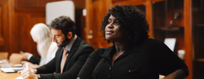Woman sitting looking focused