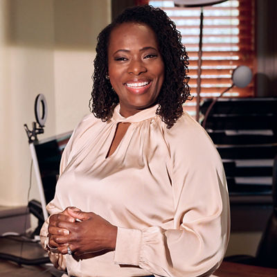 Woman in an office smiling