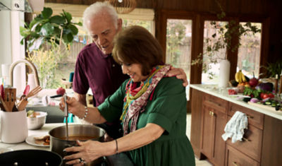 Couple in the kitchen over a pot