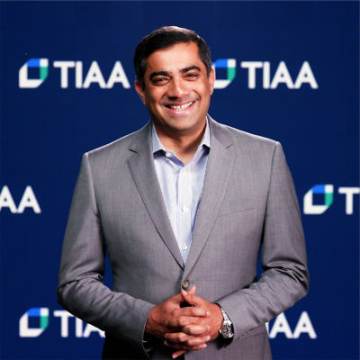 picture of Niladri 'Neel' Mukherjee, Chief Investment Officer giving a webinar on Market Volatility in the TIAA studio