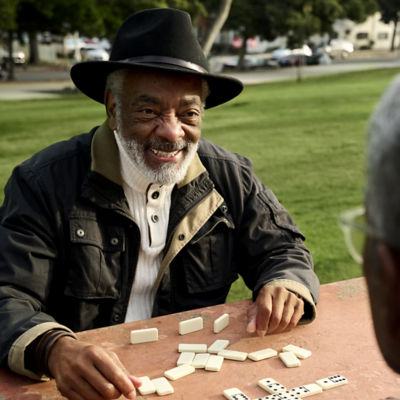 Man playing dominos 