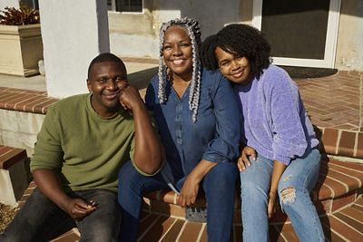 a group of people sitting on a step