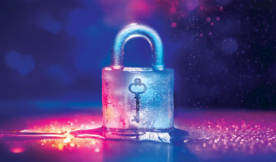 A key frozen inside an ice padlock represents the delayed liquidity of some annuities.
