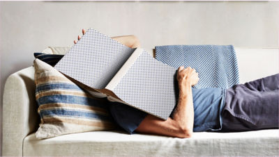 Click image of person on couch with open book covering face Opens pdf
