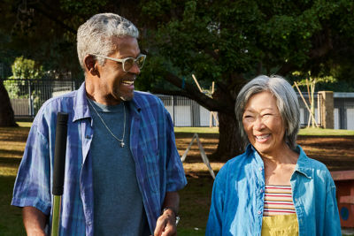 Older couple discussing their investment goals and risk tolerance.