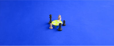 Chess pieces around the table